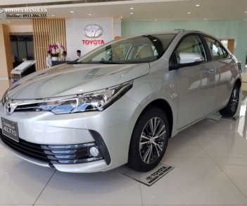 Toyota Corolla altis 1.8G 2018 - Bán ô tô Toyota Corolla Altis 1.8G sản xuất năm 2018, màu bạc, giá cực tốt. LH ngay nhận KM hấp dẫn tháng 5