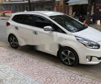 Kia Rondo 2015 - Cần bán gấp Kia Rondo sản xuất 2015, màu trắng giá cạnh tranh