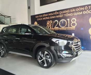 Hyundai Tucson 1.6 AT Turbo  2018 - Bán xe Hyundai Tucson 1.6 AT Turbo đời 2018, màu đen, 900 triệu