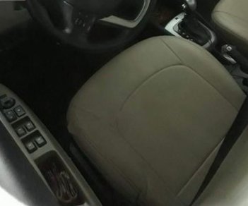 Kia Rio 1.4 AT 2015 - Cần bán gấp Kia Rio 1.4 AT sản xuất năm 2015, màu nâu, nhập khẩu