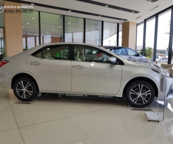 Toyota Corolla altis 1.8G 2018 - Bán ô tô Toyota Corolla Altis 1.8G sản xuất năm 2018, màu bạc, giá cực tốt. LH ngay nhận KM hấp dẫn tháng 5