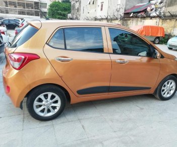 Hyundai Premio 1.2 AT 2016 - Bán xe Hyundai Grand i10 1.2 AT sản xuất năm 2016, màu vàng, nhập khẩu nguyên chiếc