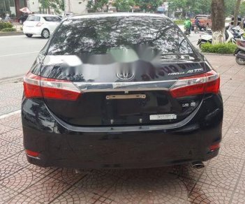 Toyota Corolla altis 1.8G 2016 - Bán Toyota Corolla Altis 1.8G đời 2016, màu đen số tự động, giá chỉ 689 triệu