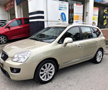 Kia Carens SXAT 2011 - Bán Kia Carens SXAT 2011, màu vàng