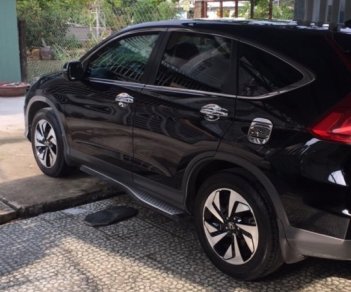 Honda CR V 2015 - Cần tiền gấp bán xe Honda CR V đời 2015, màu đen, giá chỉ 850 triệu