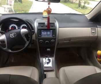 Toyota Corolla altis 1.8 2013 - Bán xe Toyota Corolla Altis đời 2013 màu bạc, 590 triệu