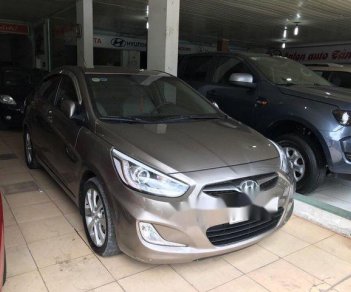 Hyundai Accent   1.4  2014 - Cần bán gấp Hyundai Accent 1.4 năm 2014, màu nâu