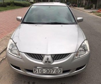 Mitsubishi Lancer    2004 - Bán xe Mitsubishi Lancer đời 2004, màu bạc ít sử dụng giá cạnh tranh