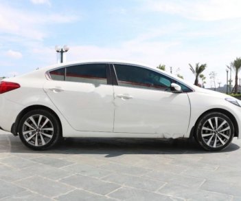 Kia K3 1.6 AT 2015 - Cần bán Kia K3 1.6 AT đời 2015, màu trắng, giá 554tr