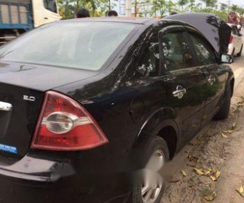 Ford Focus   2.0 2009 - Cần bán gấp Ford Focus 2.0 đời 2009, màu đen số tự động