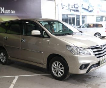 Toyota Innova E 2.0MT 2014 - Cần bán xe Toyota Innova E 2.0MT sản xuất 2014, màu vàng