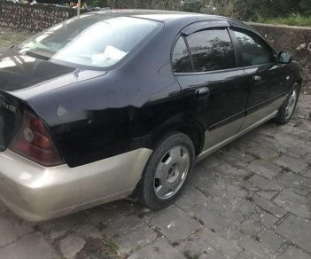 Daewoo Magnus 2004 - Bán Daewoo Magnus năm 2004, màu đen