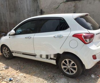 Hyundai Grand i10 2016 - Cần bán lại xe Hyundai Grand i10 năm 2016, màu trắng, nhập khẩu nguyên chiếc