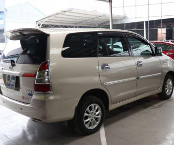 Toyota Innova E 2.0MT 2014 - Cần bán xe Toyota Innova E 2.0MT sản xuất 2014, màu vàng