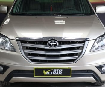 Toyota Innova E 2.0MT 2014 - Cần bán xe Toyota Innova E 2.0MT sản xuất 2014, màu vàng