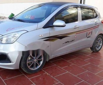 Hyundai Grand i10 2014 - Cần bán gấp Hyundai Grand i10 năm 2014, màu bạc, xe nhập chính chủ, 263 triệu