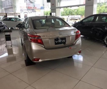 Toyota Vios 1.5E 2018 - Cần bán Toyota Vios 1.5E sản xuất 2018, màu ghi vàng