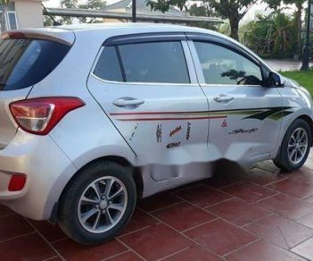 Hyundai Grand i10 2014 - Cần bán gấp Hyundai Grand i10 năm 2014, màu bạc, xe nhập chính chủ, 263 triệu