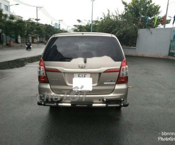 Toyota Innova E 2015 - Cần bán lại xe Toyota Innova E đời 2015 số sàn