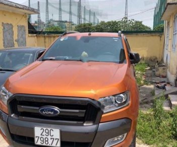 Ford Ranger Wildtrak 3.2L 4x4 AT 2017 - Cần bán gấp Ford Ranger Wildtrack 2017, màu vàng