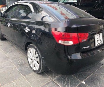 Kia Forte   EX 1.6 MT  2010 - Bán ô tô Kia Forte EX 1.6 MT đời 2010, màu đen