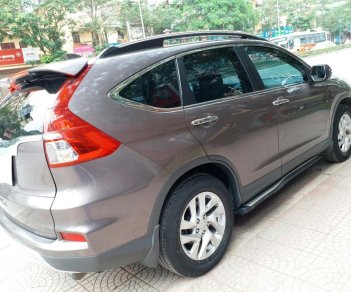 Honda CR V 2.0 2016 - Bán Honda CR-V 2.0 AT sản xuất 12/2016 màu nâu, nội thất kem, số tự động, biển Hà Nội