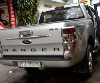 Ford Ranger XLS 2.2L 4x2 AT 2015 - Cần bán Ford Ranger XLS 2.2L 4x2 AT 2015, màu bạc, nhập khẩu còn mới, 550 triệu