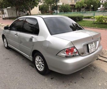 Mitsubishi Lancer    2004 - Bán xe Mitsubishi Lancer đời 2004, màu bạc ít sử dụng giá cạnh tranh