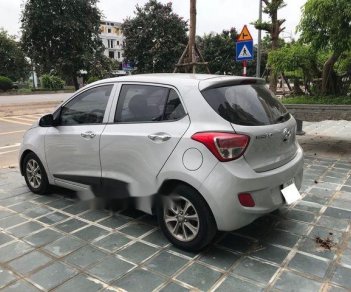 Hyundai Grand i10 2015 - Bán Hyundai Grand i10 sản xuất 2015, màu bạc số tự động, 365tr