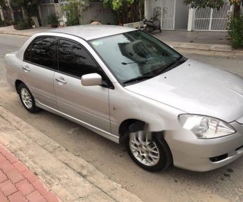 Mitsubishi Lancer    2004 - Bán xe Mitsubishi Lancer đời 2004, màu bạc ít sử dụng giá cạnh tranh