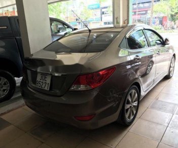 Hyundai Accent   1.4  2014 - Cần bán gấp Hyundai Accent 1.4 năm 2014, màu nâu