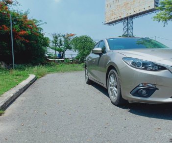 Mazda 3 1.5AT 2016 - Bán Mazda 3 1.5AT Sedan đời 2016, màu vàng