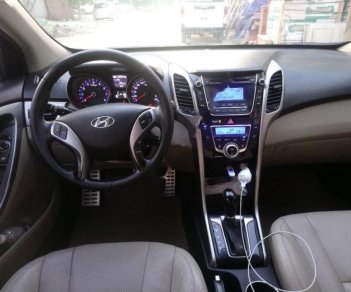 Hyundai i30 1.6 AT 2013 - Cần bán lại xe Hyundai i30 sản xuất 2013, màu đen, xe nhập, 525tr