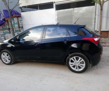 Hyundai i30 1.6 AT 2013 - Cần bán lại xe Hyundai i30 sản xuất 2013, màu đen, xe nhập, 525tr