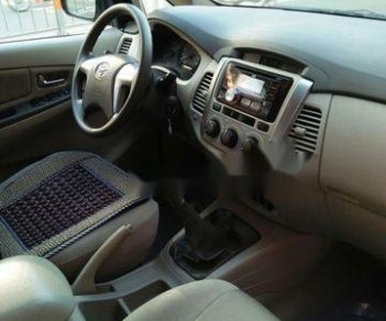 Toyota Innova 2014 - Cần bán lại xe Toyota Innova đời 2014, màu bạc chính chủ, giá 560tr