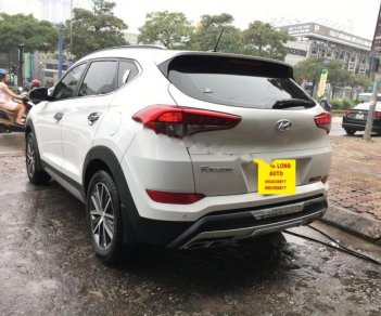 Hyundai Tucson 2.0AT 2018 - Cần bán lại xe Hyundai Tucson 2.0AT sản xuất 2018, màu trắng, xe nhập