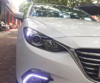 Mazda 3 1.5AT   2015 - Cần bán xe Mazda 3 1.5AT Sedan, năm sản xuất 2015, màu trắng, 609 triệu
