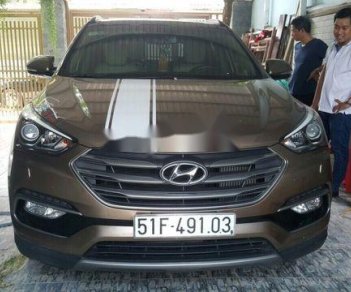 Hyundai Santa Fe 2.2AT  2016 - Cần bán gấp Hyundai Santa Fe 2.2AT năm sản xuất 2016, màu nâu 