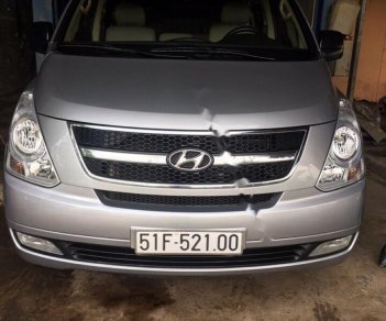 Hyundai Grand Starex 2.5 MT 2015 - Cần bán xe Hyundai Grand Starex 2.5 MT đời 2015, màu bạc, xe nhập còn mới