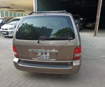 Kia Carnival 2009 - Cần bán Kia Carnival đời 2009, màu vàng