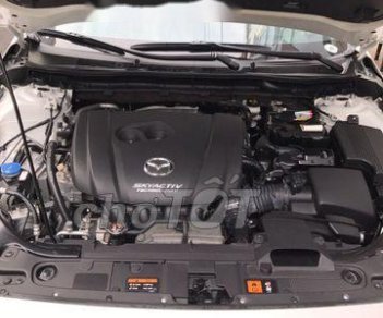 Mazda 6 2.0 2015 - Bán Mazda 6 2.0 năm sản xuất 2015, màu trắng, giá 750tr