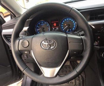 Toyota Corolla altis 1.8G AT 2015 - Cần bán Toyota Corolla altis 1.8G AT đời 2015, màu đen  