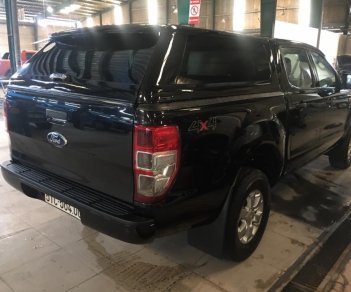 Ford Ranger Base 2.2 MT 4x4 2014 - Cần bán xe Ford Ranger Base 2.2 MT 4x4 đời 2014, màu đen, giá cả thương lượng