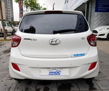 Hyundai Grand i10  1.2 AT 2016 - Cần bán lại xe Hyundai Grand i10 1.2 AT đời 2016, màu trắng, xe nhập