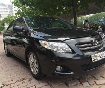 Toyota Corolla 2009 - Bán Toyota Corolla sản xuất năm 2009, màu đen, xe nhập, 475 triệu