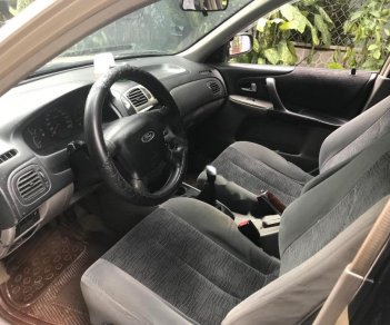 Ford Laser 2002 - Bán xe Ford Laser sản xuất 2002, màu vàng, 200tr