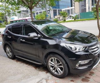 Hyundai Santa Fe 2.2L 4WD 2016 - Cần bán Hyundai Santa Fe 2.2L 4WD năm 2016, màu đen, giá tốt