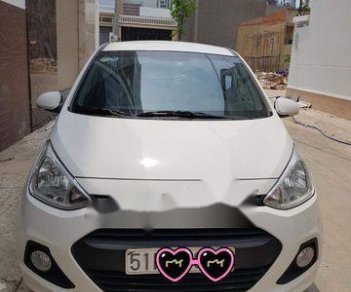 Hyundai Grand i10  1.2 AT 2015 - Cần bán Hyundai Grand i10 1.2 AT sản xuất năm 2015, màu trắng mới chạy 18.000 km giá cạnh tranh