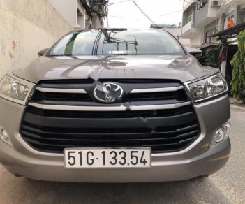 Toyota Innova 2017 - Bán Toyota Innova sản xuất năm 2017, màu nâu số sàn