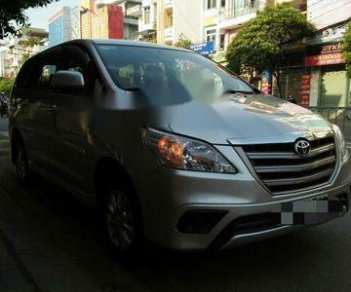 Toyota Innova 2014 - Cần bán lại xe Toyota Innova đời 2014, màu bạc chính chủ, giá 560tr